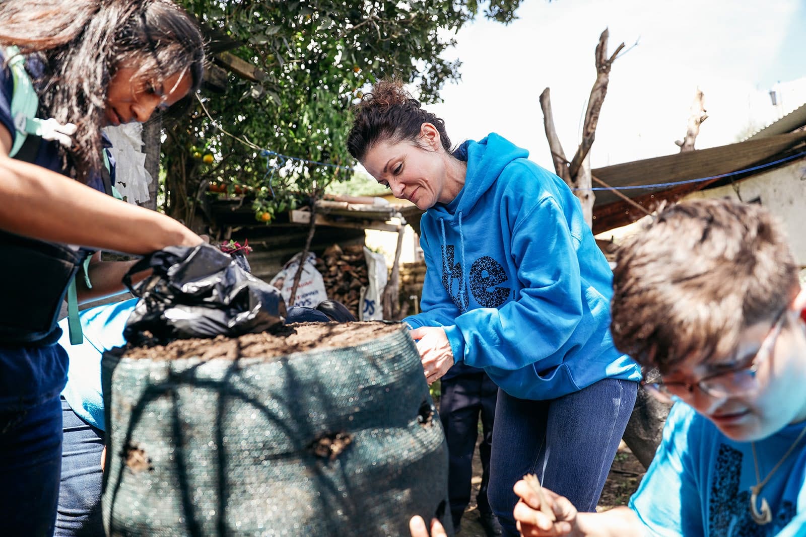 Why choose ethical Guatemala volunteer vacations, volunteers working hands-on in a community garden project 