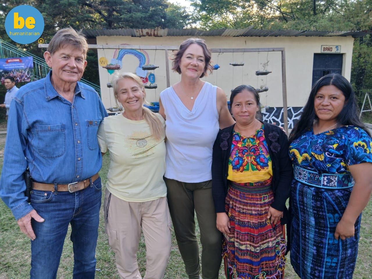 Diverse group of local partners and travelers participating in the best Guatemala volunteer vacation programs for seniors.