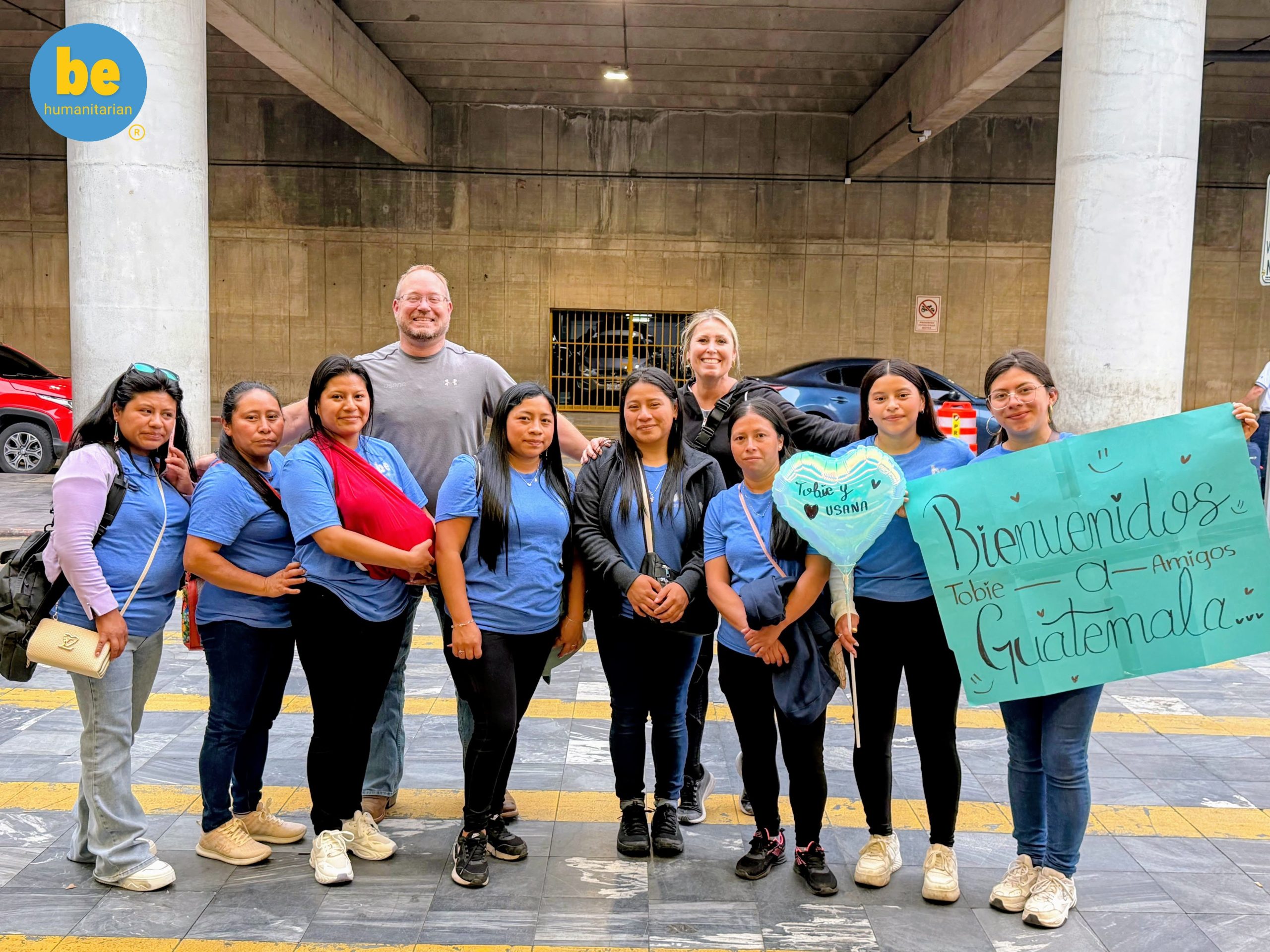 Group photo showing local customs etiquette Guatemala volunteers practice during a warm community welcome