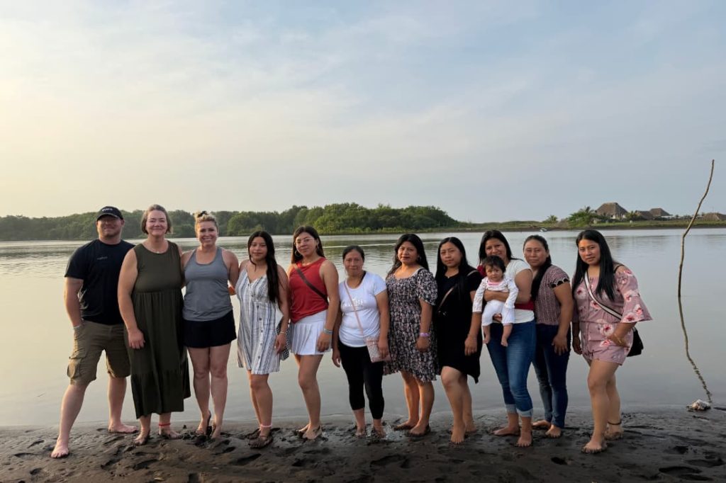 Corporate philanthropy volunteer projects Guatemala connect volunteers and locals along the shoreline