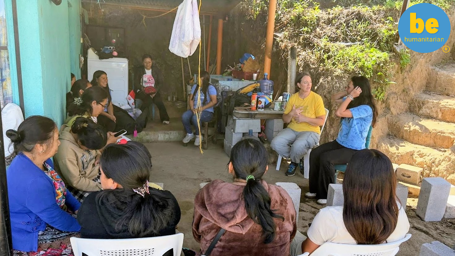 Volunteers meet with women in rural Guatemala, showing how volunteer vacations impact rural Guatemala communities. 